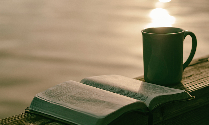 Photo of Bible and coffee cup
