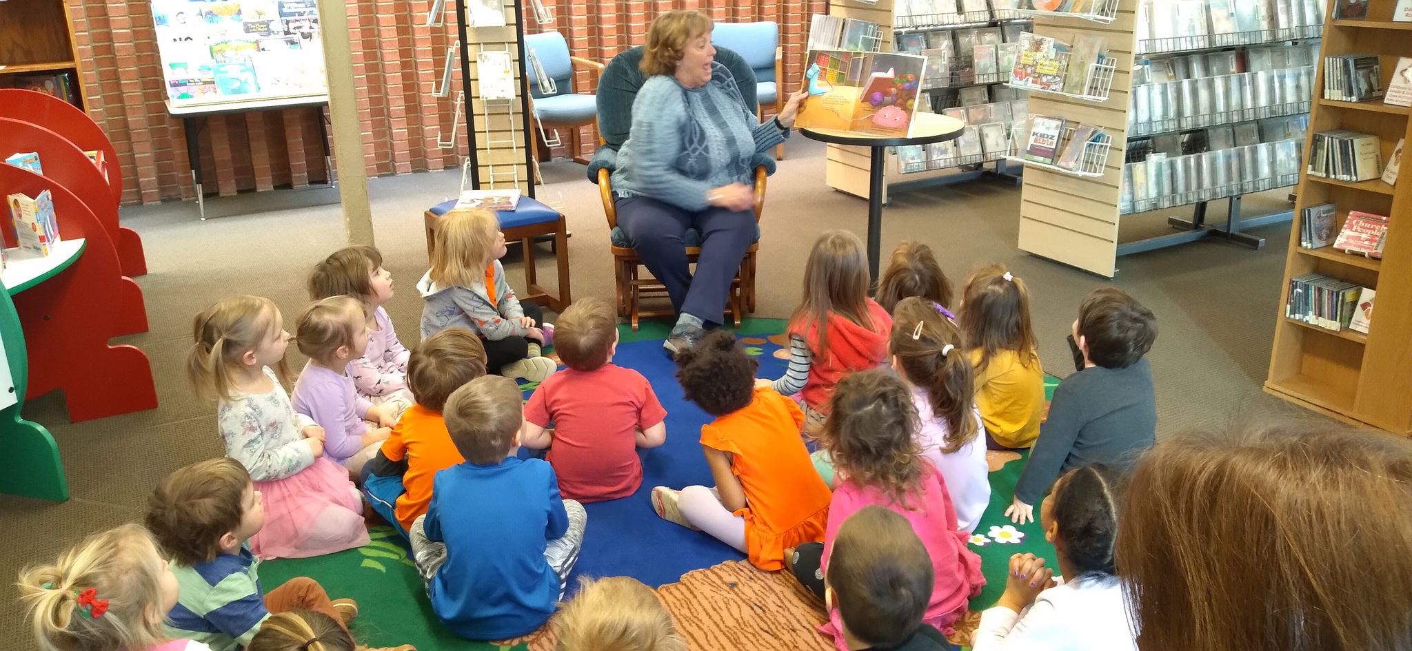 Reading to kids in the OSL Library